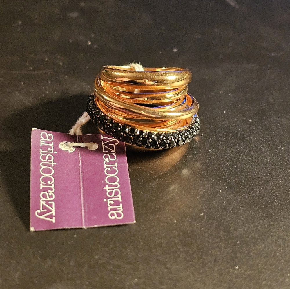 Arisrocrazy $500 ring. Size about 6 1/2 but will fit smaller because it's a thic